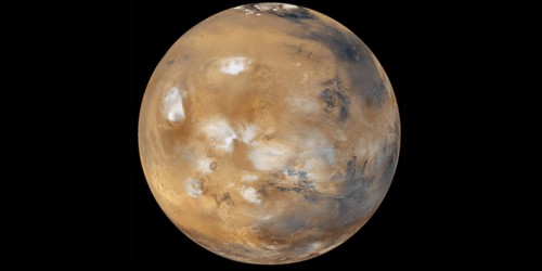 Mars' atmosphere is much thinner now than it once was, but it still clouds, as seen in this NASA photo, as well as wind, dust storms and snow. Photo Credit: NASA/JPL