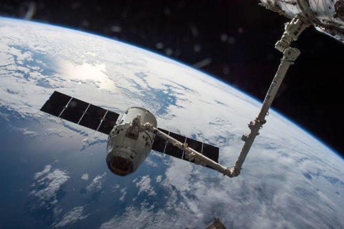 A SpaceX cargo Dragon is seen here while delivering supplies to the ISS for NASA / mission CRS-8. Photo Credit: NASA