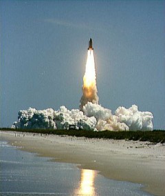 Challenger roars into orbit on her maiden voyage. Photo Credit: NASA