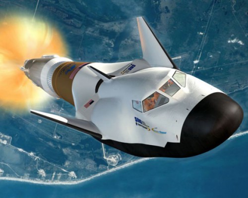 Artist's conception of the Dream Chaser launching on an Atlas V rocket. Image Credit: Sierra Nevada Corporation
