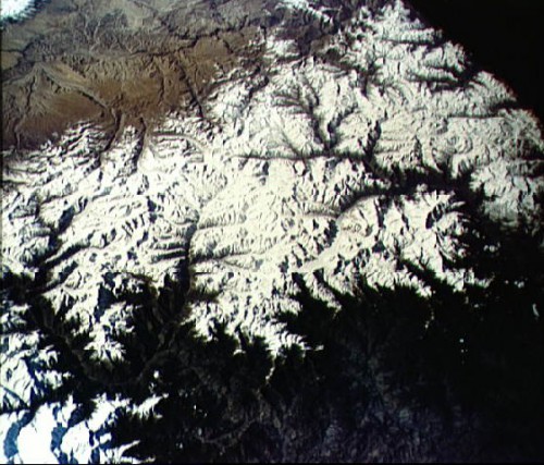 Spectacular view of the Himalayas from Faith 7. Cooper's assertion that he saw chimney smoke twirling from Himalayan houses was doubted by some, although subsequent research confirmed that it was possible to observe surprisingly fine detail from orbit. Photo Credit: NASA