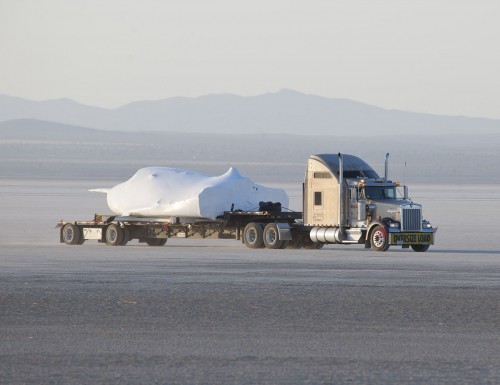 The Dream Chaser test vehicle, under protective wrap, being transported to the Dryden Flight Research Center. Photo Credit: NASA / Tom Tschida