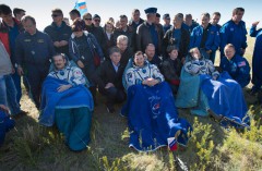 Hadfield, Romanenko and Marshburn gain their first impressions of life back on Earth in the minutes after extraction from the Soyuz TMA-07M descent module. Photo Credit: NASA