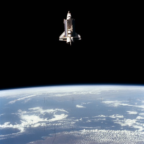 The presence of a camera aboard the Shuttle Pallet Satellite (SPAS) enabled this astonishing view of Challenger in orbit to be taken. It marked the first time that an image had ever been acquired of the whole Shuttle in space. Photo Credit: NASA