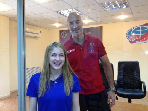 Abby Harrison poses with Expedition 36/37's Luca Parmitano. Abby provides updates about Parmitano's "Volare" mission through her website. Photo Credit: Astronaut Abby's Facebook page.