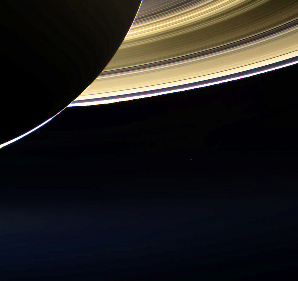 Earth, as seen by the Cassini spacecraft on July 19, 2013 (the tiny blue speck in the distance below Saturn’s rings in this view). Photo Credit: NASA / JPL-Caltech / SSI / Jason Major