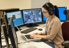 Estrellina Pacis on console as science lead in the Multi-Mission Operations Center during a Surface Telerobotics Operational Readiness Test at NASA's Ames Research Center. Image Credit: NASA/Dominic Hart posted on AmericaSpace