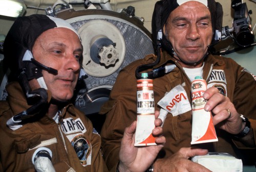 Tom Stafford (left) and Deke Slayton sample some of Alexei Leonov's "vodka". Photo Credit: NASA