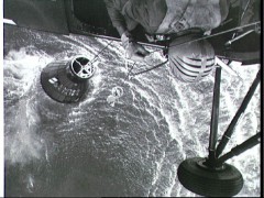 The heroic efforts of the helicopter crew to recover Liberty Bell 7 and their close proximity to the water is amply illustrated in this view. Photo Credit: NASA 