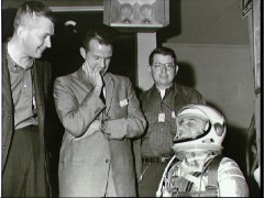 Gus Grissom chuckles during Liberty Bell 7 pre-launch tasks, as fellow Mercury astronaut Gordo Cooper (center) looks on. Photo Credit: NASA