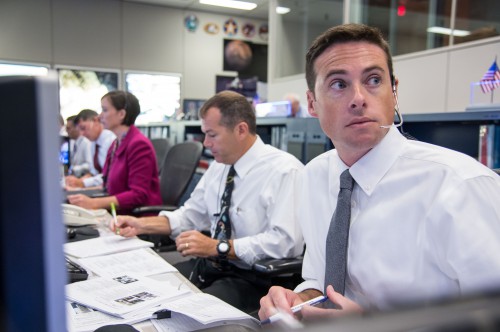 David Korth (second from right) served as ISS Flight Director in Mission Control during EVA-23. It was his call to terminate the spacewalk on safety grounds. Photo Credit: NASA