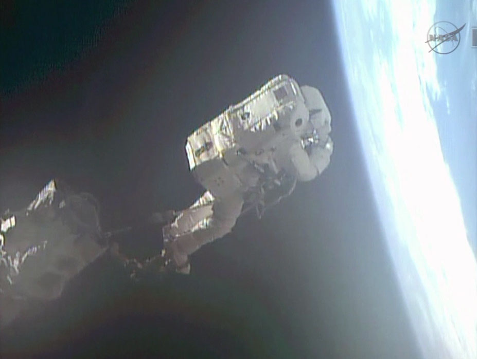 Riding the 57-foot-long Canadarm2, Luca Parmitano became Italy's first spacewalker earlier today. He joins representatives of Russia, the United States, France, Germany, Japan and Canada in having accomplished this remarkable feat. Photo Credit: NASA TV