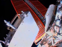 The suitcase-like Passive Experiment Container (PEC) is removed by Luca Parmitano - Italy's first spacewalker - during today's EVA. Photo Credit: NASA TV