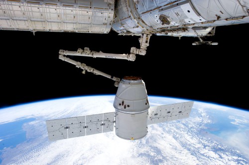 An unmanned Dragon (CRS-2) grappled by the International Space Station