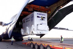 Secured within its transport crate, KOMPSAT-5 is removed from the Antonov-124, after its flight from South Korea to Orsk, Russia. Photo Credit: Kosmotras