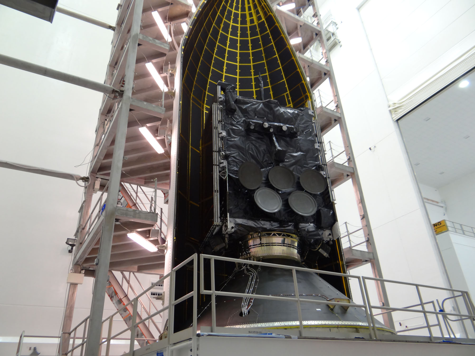 WGS-6 is encapsulated within its two-piece ("bisector") payload fairing, ahead of tonight's launch. Photo Credit: ULA