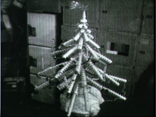 The makeshift Christmas tree built by Carr, Gibson and Pogue from old food containers and packaging also included a long-tailed star at its tip: Comet Kohoutek. Photo Credit: NASA