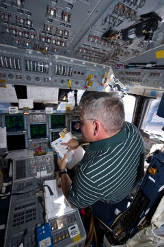 Greg Johnson works at the pilot's station during STS-134 - the final voyage of Space Shuttle Endeavour - in May 2011. Photo Credit: NASA
