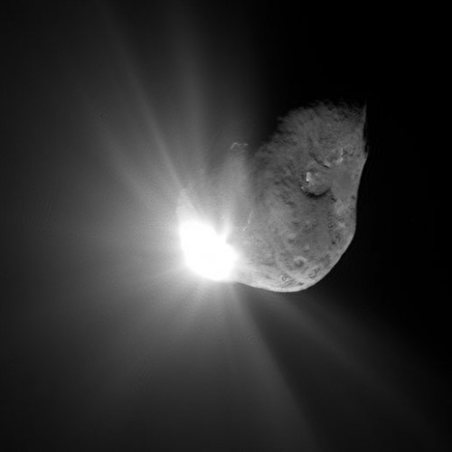 This spectacular image of comet Tempel 1 was taken 67 seconds after it obliterated Deep Impact's impactor spacecraft. The image was taken by the high-resolution camera onboard Deep Impact.  Photo Credit: NASA/JPL-Caltech/UMD 