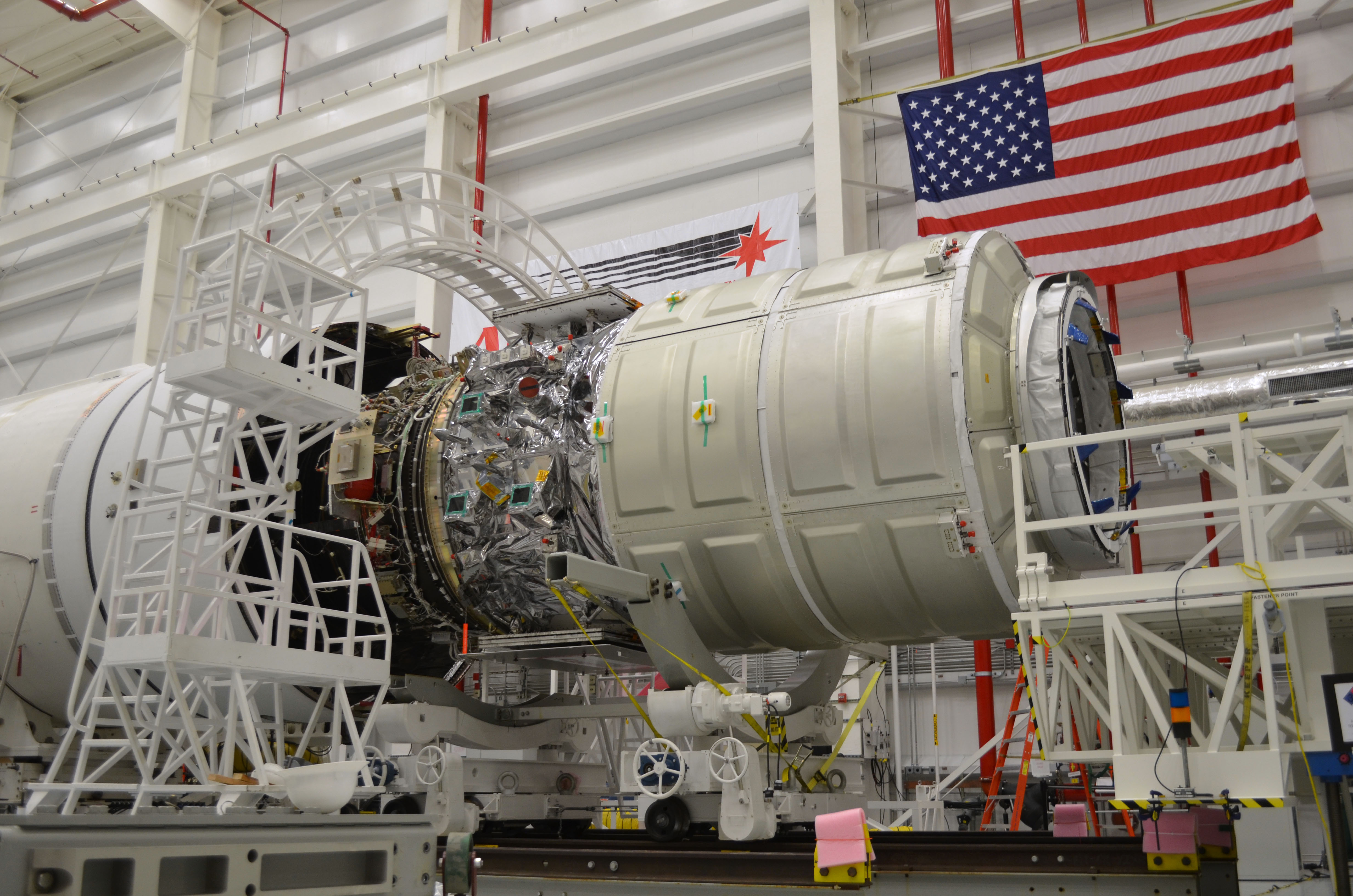 NASA Orbital image of Cygnus 1 spacecraft being integrated into Antares rocket posted on AmericaSpace