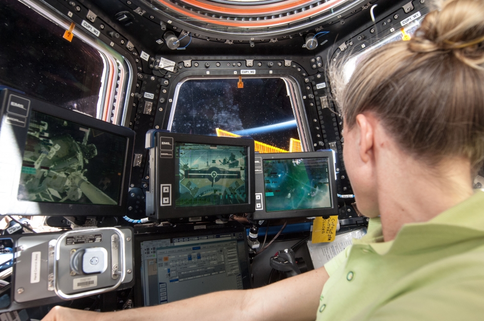 NASA image of astronaut Karen Nyberg inside the International Space Station ISS Cupola posted on AmericaSpace