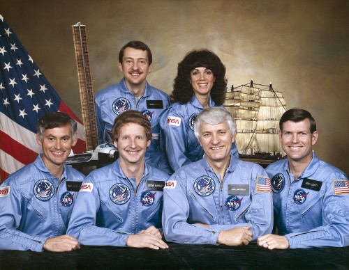 The crew of STS-41D boasted the commercial industry's first astronaut, Charles Walker. He is pictured at top left (next to Judith Resnik). At bottom, crew members Mike Mullane, Steve Hawley, Hank Hartsfield and Mike Coats smile for the camera. Photo Credit: NASA 