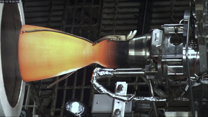 One of Boeing's CST-100 thrusters glows red-hot during a recent test on its orbital maneuvering and attitude control system (OMAC) in Las Cruces, New Mexico. This test brings the spacecraft closer to fulfilling its commercial crew missions. Photo Credit: Boeing.