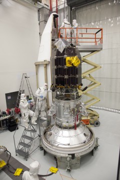 The LADEE spacecraft is encapsulated within its payload shroud on 26 August, preparatory to installation atop the Minotaur V launch vehicle. Photo Credit: NASA