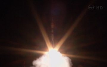 Soyuz TMA-10M rockets into orbit at 2:58 a.m. Kazakh time Thursday (4:58 p.m. EDT Wednesday), carrying Oleg Kotov, Sergei Ryazansky and Mike Hopkins to the International Space Station. Photo Credit: NASA