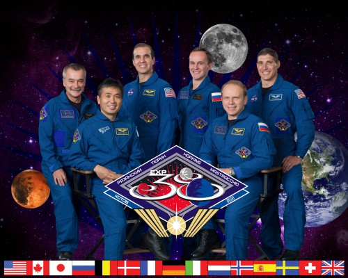 After the departure of the Soyuz TMA-09M crew - and the Olympic torch - the Expedition 38 crew from November 2013 until March 2014 will look like this. Seated at left is Koichi Wakata, with Oleg Kotov seated at right. Flanking them from left to right are Mikhail Tyurin, Rick Mastracchio, Sergei Ryazansky and Mike Hopkins. Photo Credit: NASA