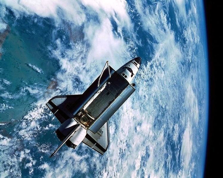 Thanks to the camera aboard the ASTRO-SPAS payload, this remarkable view of Discovery drifting against the blue and white backdrop of Earth was acquired. Photo Credit: NASA