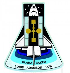 The laboratory-flask-shaped patch of the STS-43 crew also paid homage to the shape of Alan Shepard's Freedom 7 Mercury capsule. Image Credit: NASA