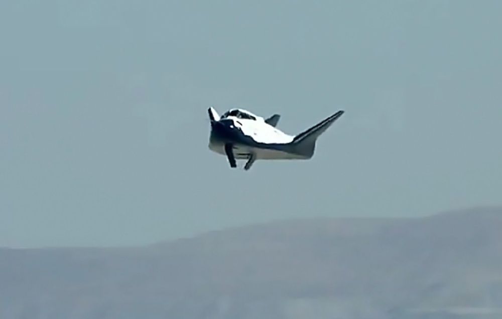 Dream Chaser on final, the left landing gear clearly not deployed.  Photo Credit: SNC