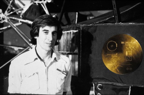 Jon Lomberg, Project Director for the New Horizons  Message Initiative, was Design Director for NASA’s Voyager Golden  Record. This photo was taken at NASA’s Jet Propulsion Laboratory in  1981. Lomberg drew the design visible on the Record’s cover, a  drawing with an estimated lifetime of 1000 billion years.  Photo Credit: Jon Lomberg / www.jonlomberg.com