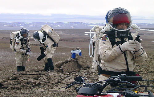 Depiction of crew members during a simulated EVA at the isolated Canadian-Arctic testing grounds.  Photo Credit: Mars Society