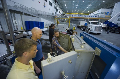 Alexander Gerst (in blue shirt) and NASA astronaut Reid Wiseman (in yellow shirt) are pictured during a training session for their Expedition 40/41 mission. Photo Credit: ESA