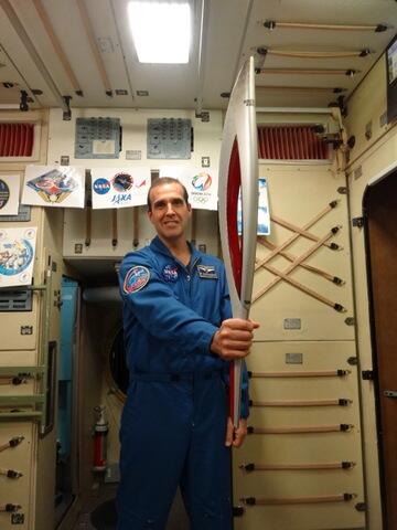 At his final exam on Russian Orbital Segment (ROS) systems, on 15 October 2013, NASA astronaut Rick Mastracchio holds a model of the Sochi Olympic torch that his crew will carry on its highest relay to the International Space Station (ISS) on 7 November. Photo Credit: NASA/Rick Mastracchio Twitter page