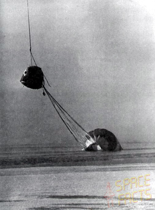 Soyuz 23's descent module and deflated parachute are hoisted from the icy waters of Lake Tengiz. Photo Credit: Joachim Becker / SpaceFacts.de