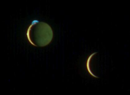 Jupiter's moons Io (left) and Europa (right) are captured on the same frame, by the camera onboard the New Horizons probe in 2007, two days after its closest approach to Jupiter on its way to Pluto. Io's Tvashtar volcano is seen erupting at the upper left corner of the moon's disk. The plume erupted, reached a height of 300 km above the surface of Io. Two smaller plumes can also be seen. Image credit: NASA/Johns Hopkins University Applied Physics Laboratory/Southwest Research Institute 