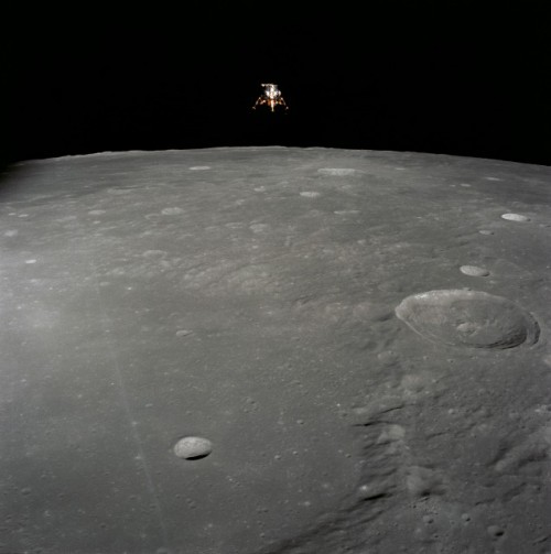 Photographed by Dick Gordon, the lunar module Intrepid heads towards Powered Descent and a touchdown on the Ocean of Storms. Photo Credit: NASA