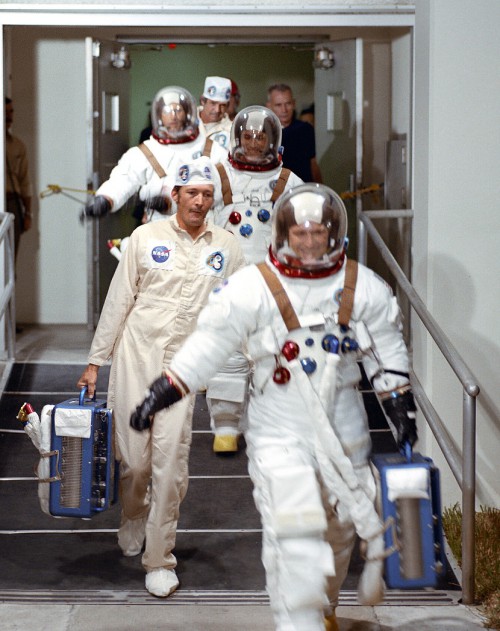 Gerry Carr leads his crew out of the astronaut quarters at the Kennedy Space Center in the hours before launch. Photo Credit: NASA