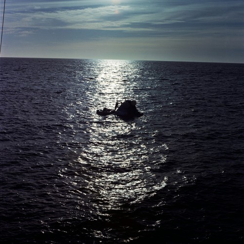 In the beautifully calm waters of the Pacific, the command module of the final Skylab crew bobs gently after 84 days in space. Photo Credit: Joachim Becker/SpaceFacts.de