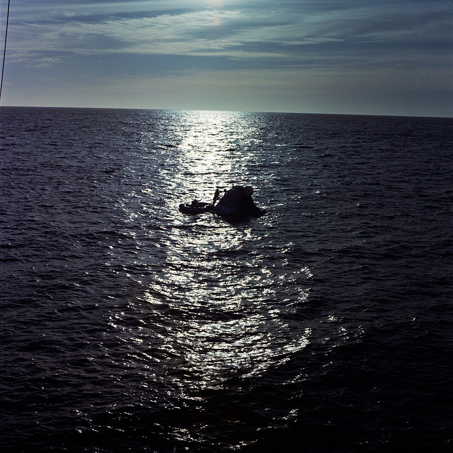 In the beautifully calm waters of the Pacific, the command module of the final Skylab crew bobs gently after 84 days in space. Photo Credit: Joachim Becker/SpaceFacts.de