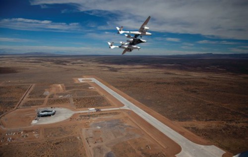 WhiteKnight Two carrying SpaceShit Two during testing, above Spaceport America. Image Credit: Virgin Galactic