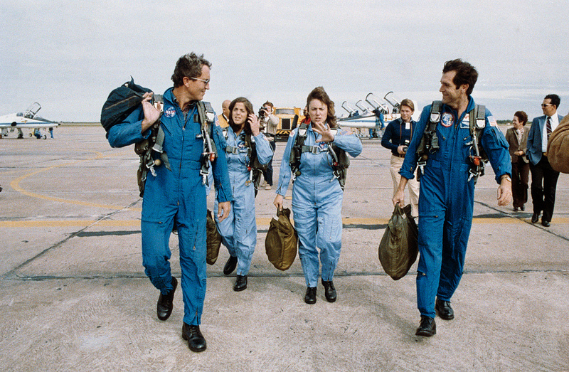 Commander Dick Scobee (right) and Pilot Mike Smith, pictured with Barbara Morgan and Christa McAuliffe during training. Photo Credit: NASA