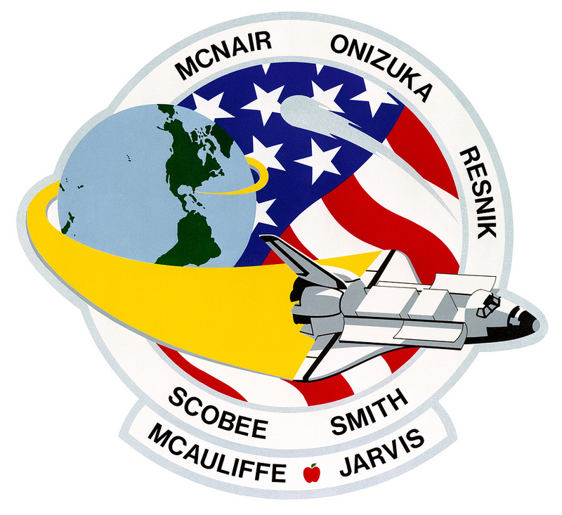Emblazoned with the names of its seven "star voyagers", the crew patch for Mission 51L illustrated its myriad objectives. Halley's Comet is prominently displayed, as is an apple next to the name of school teacher Christa McAuliffe. Image Credit: NASA