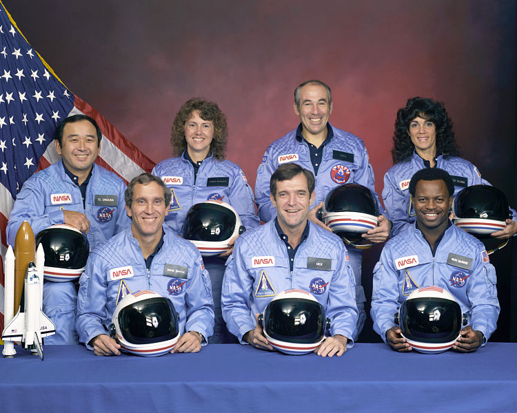 Challenger's final crew, as they should be remembered: Positive and brilliant individuals, happily striving to explore space and further humanity's reach into the Universe. In the back row (left to right) Ellison Onizuka, Christa McAuliffe, Greg Jarvis and Judy Resnik. In the front row (left to right) Mike Smith, Dick Scobee, and Ron McNair. Image Credit: NASA