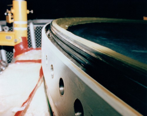 Close-up view of the rubberized O-ring seals within the Solid Rocket Booster casing. These seals were intended to prevent a leakage of hot gases, but on Mission 51L they failed spectacularly. Photo Credit: NASA