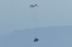 A test version of NASA’s Orion spacecraft floats through the sky about the U.S. Army’s Yuma Proving Ground, near Yuma, Ariz., under the two drogue parachutes that precede the release of its three main parachutes. Photo Credit: NASA