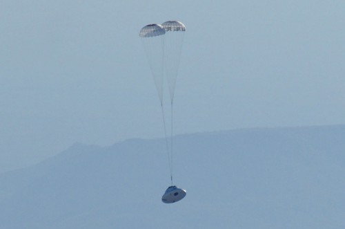 A test version of NASA’s Orion spacecraft floats through the sky about the U.S. Army’s Yuma Proving Ground in Arizona under the two drogue parachutes that precede the release of its three main parachutes. Photo Credit: NASA